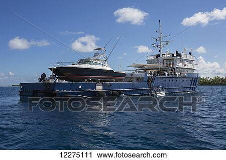 Stock Image - Large sports fishing boat; Tahiti. Fotosearch