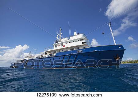 Stock Photo - Large sports fishing boat; Tahiti. Fotosearch