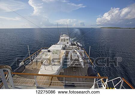 Stock Photograph - Large sports fishing boat; Tahiti. Fotosearch