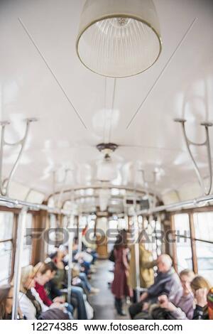 Stock Photography - Light on the ceiling of a tram; Milan, Lombardy, Italy. Fotosearch
