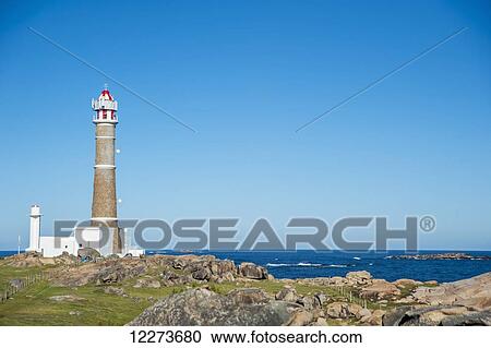 Lighthouse along the rocky coast; Cabo Polonio, Uruguay View Large Photo Image Stock Image - Lighthouse along the rocky coast; Cabo Polonio, Uruguay. Fotosearch
