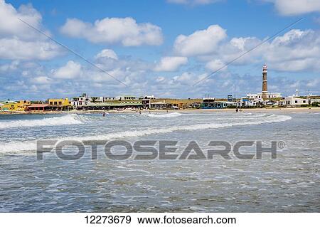 Lighthouse and accommodation buildings along the waterfront; Cabo Polonio, Uruguay View Large Photo Image Stock Photo - Lighthouse and accommodation buildings along the waterfront; Cabo Polonio, Uruguay. Fotosearch