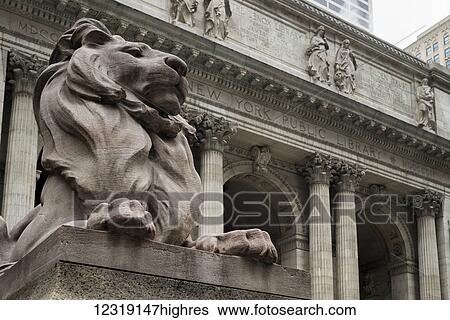 Stock Photograph - Lion statue outside New York Public Library; New York City, New York, United States of America. Fotosearch