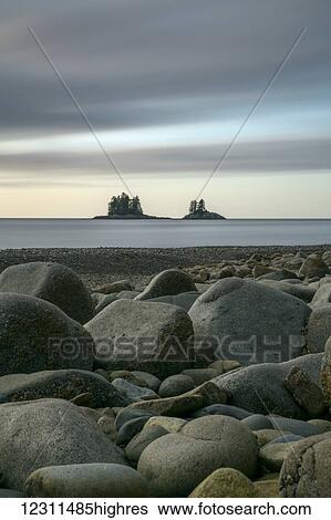 Long exposure image of the clouds over the ocean; Haida Gwaii, British Columbia, Canada View Large Photo Image Stock Photograph - Long exposure image of the clouds over the ocean; Haida Gwaii, British Columbia, Canada. Fotosearch