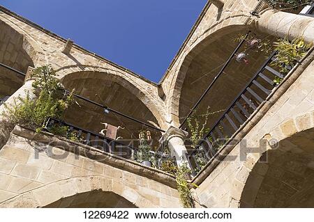Low angle view of a building with pillars and arches; Paphos, Cyprus View Large Photo Image Stock Image - Low angle view of a building with pillars and arches; Paphos, Cyprus. Fotosearch