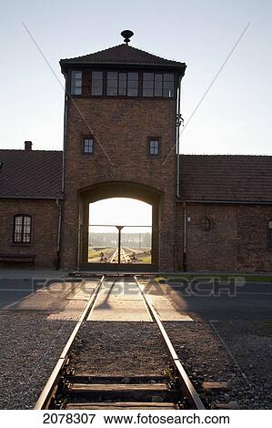 Main Guard House (Gate Of Death) At Sunset, Auschwitz-Birkenau Concentration Camp, Oswiecim, Malopolska, Poland View Large Photo Image Stock Photo - Main Guard House (Gate Of Death) At Sunset, Auschwitz-Birkenau Concentration Camp, Oswiecim, Malopolska, Poland. Fotosearch