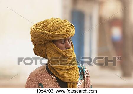 Malian man wearing headscarf in Segou, Mali View Large Photo Image Stock Image - Malian man wearing headscarf in Segou, Mali. Fotosearch