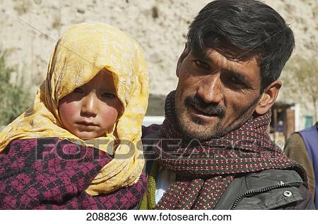 Man And Girl, Istak Nala, Northern Areas, Pakistan View Large Photo Image Stock Photograph - Man And Girl, Istak Nala, Northern Areas, Pakistan. Fotosearch
