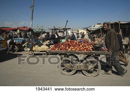 Man Pushing An Apple-Laden Cart On A Kabul Street,, Afghanistan View Large Photo Image Stock Image - Man Pushing An Apple-Laden Cart On A Kabul Street,, Afghanistan. Fotosearch