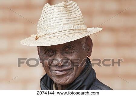 Picture - Man Wearing A Straw Hat In Ambalavao, Fianarantsoa Province, Madagascar. Fotosearch