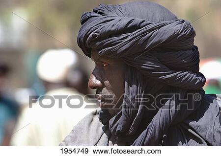 Stock Photo - Man with turban at the Monday Market in Djenne, Mali. Fotosearch