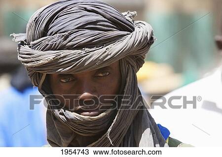 Man with turban at the Monday Market, Djenne, Mali View Large Photo Image Stock Image - Man with turban at the Monday Market, Djenne, Mali. Fotosearch