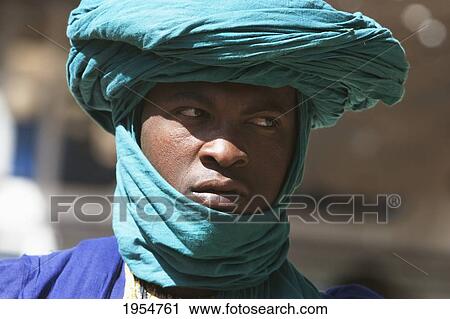 Stock Image - Man with turban, Monday Market, Djenne, Mali. Fotosearch