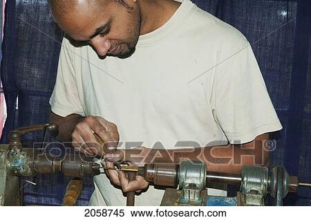 Man Working On Wooden Pieces For Ship Models At The Bobato Ltee Factory, Curepipe, Mauritius View Large Photo Image Stock Photography - Man Working On Wooden Pieces For Ship Models At The Bobato Ltee Factory, Curepipe, Mauritius. Fotosearch