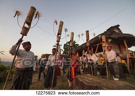 Manggarai men performing a traditional dance with poles, Melo village, Flores, East Nusa Tenggara, Indonesia View Large Photo Image Stock Image - Manggarai men performing a traditional dance with poles, Melo village, Flores, East Nusa Tenggara, Indonesia. Fotosearch