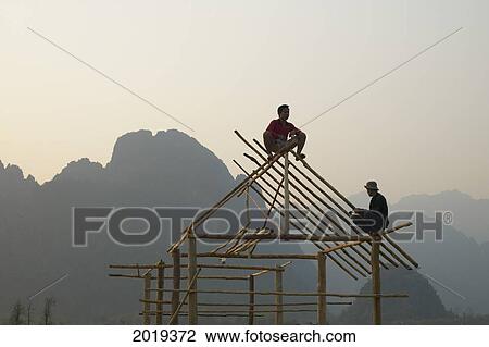 Men Building A House, Laos View Large Photo Image Stock Image - Men Building A House, Laos. Fotosearch