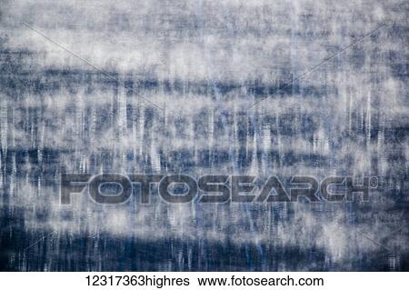 Stock Photograph - Morning mist and tree reflections on Lake 16, Hubbard County; Minnesota, United States of America. Fotosearch