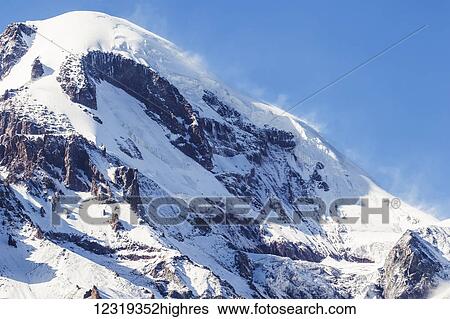 Mount Kazbek in the Caucasus Mountains; Kazbegi, Mtskheta-Mtianeti, Georgia View Large Photo Image Stock Photograph - Mount Kazbek in the Caucasus Mountains; Kazbegi, Mtskheta-Mtianeti, Georgia. Fotosearch