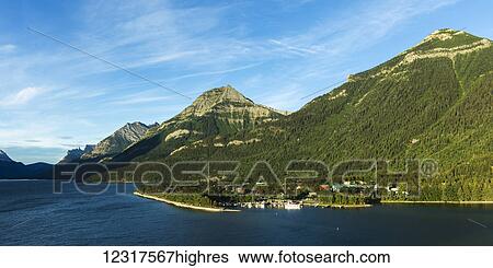 Stock Photograph - Mountains covered with forests in Waterton Lakes National Park; Alberta, Canada. Fotosearch