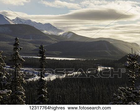 Muncho Lake in winter, Muncho Lake Provincial Park; British Columbia, Canada View Large Photo Image Stock Photograph - Muncho Lake in winter, Muncho Lake Provincial Park; British Columbia, Canada. Fotosearch