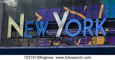 Stock Photograph - Neon sign for New York in Times Square; New York City, New York, United States of America. Fotosearch