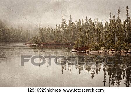 Stock Photograph - Northern autumn landscape in fog and ice; Thunder Bay, Ontario, Canada. Fotosearch