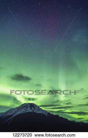 Northern Lights above the Chugach Mountains South of Girdwood, Southcentral Alaska, USA. View Large Photo Image Stock Image - Northern Lights above the Chugach Mountains South of Girdwood, Southcentral Alaska, USA.. Fotosearch