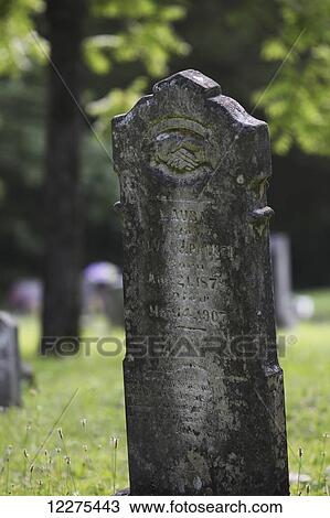Old, early 20th century grave stone with writing visible on the stone; United States of America View Large Photo Image Stock Image - Old, early 20th century grave stone with writing visible on the stone; United States of America. Fotosearch
