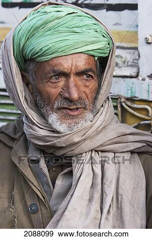 Stock Photo - Old Man Waiting For Aid And Relief Goods Near The Line Of Control, Chakothi, Azad Kashmir, Pakistan. Fotosearch
