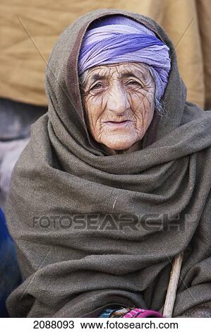 Old Woman Waiting For Aid And Relief Goods Near The Line Of Control, Chakothi, Azad Kashmir, Pakistan View Large Photo Image Stock Image - Old Woman Waiting For Aid And Relief Goods Near The Line Of Control, Chakothi, Azad Kashmir, Pakistan. Fotosearch
