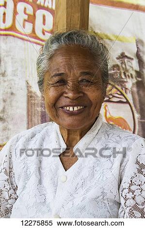 Stock Photography - Older Indonesian woman, Semparu, Lombok, West Nusa Tenggara, Indonesia. Fotosearch