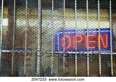 Stock Image - Open Sign Behind Metal Gate. Fotosearch