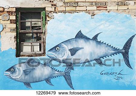 Stock Photo - Painting of fish underwater on a wall; Ciclana de la Frontera, Andalusia, Spain. Fotosearch