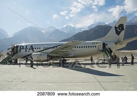 Stock Photo - Pakistan International Airlines Boeing 737, Skardu Airport, Northern Areas, Pakistan. Fotosearch