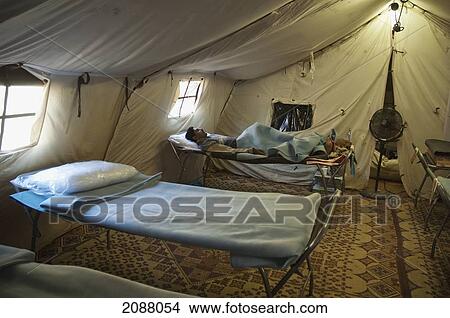 Picture - Patient In The Field Hospital Of Canada's Dart (Disaster Assistance Response Team) After The 8 October 2005 Earthquake, Garhi Dopatta, Azad Jammu & Kashmir, Pakistan. Fotosearch