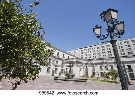 Stock Image - Patio De Los Naranjos At The Palacio De La Moneda Presidential Palace, Santiago, Metropolitan Region, Chile. Fotosearch