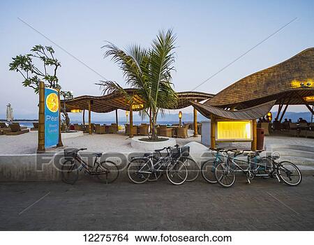 Picture - Pearl Beach Lounge at dusk, Gili Trawangan, West Nusa Tenggara, Indonesia. Fotosearch