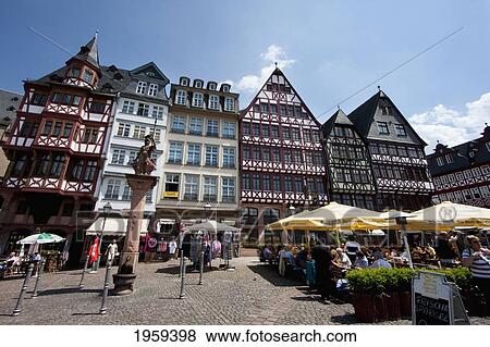 Stock Photo - People At The Reconstructions Of 15Th And 16Th Century Houses On The Romerberg, Frankfurt Am Main, Germany. Fotosearch