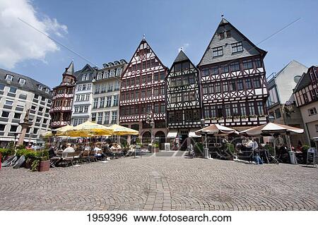 Stock Photograph - People At The Reconstructions Of 15Th And 16Th Century Houses On The Romerberg, Frankfurt Am Main, Germany. Fotosearch