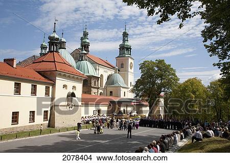Picture - People Attending An Open Air Sunday Mass At The Basilica Of Our Lady Of The Angels, Kalwaria Zebrzydowska Sanctuary, Malopolska, Poland. Fotosearch