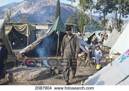 People In A Relief Camp After The 8 October 2005 Earthquake, Muzaffarabad, Azad Kashmir, Pakistan View Large Photo Image Picture - People In A Relief Camp After The 8 October 2005 Earthquake, Muzaffarabad, Azad Kashmir, Pakistan. Fotosearch