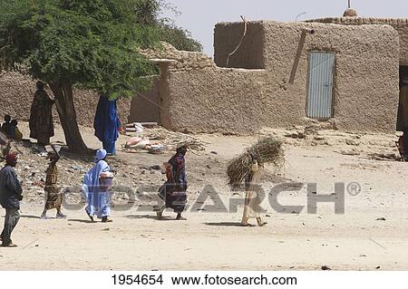 People in a village along the Niger River between Niafunke and Kabara, Mali View Large Photo Image Picture - People in a village along the Niger River between Niafunke and Kabara, Mali. Fotosearch