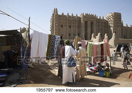 Stock Photo - People In Front Of The Grand Mosque In Djenne, Mali. Fotosearch