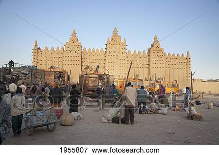 Stock Photo - People In Front Of The Grand Mosque, Djenne, Mali. Fotosearch