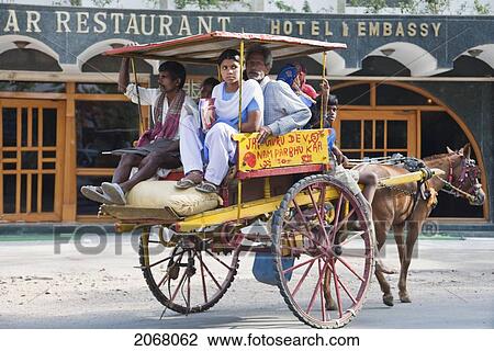 Stock Image - People On A Horse Cart, Bodhgaya, Bihar, India. Fotosearch