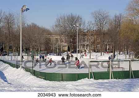 People Playing Ice Hockey In A Park View Large Photo Image Stock Image - People Playing Ice Hockey In A Park. Fotosearch
