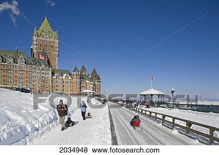 Stock Photo - People Sledding On Sidewalks. Fotosearch