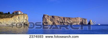 Perce Rock at the tip of the Gaspe Peninsula; Perce, Quebec, Canada View Large Photo Image Stock Image - Perce Rock at the tip of the Gaspe Peninsula; Perce, Quebec, Canada. Fotosearch