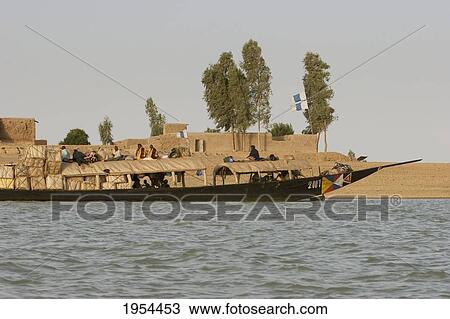 Stock Image - Pinasse Carrying Cargo And Passengers On The Niger River Between Mopti And Lake Débo, Mali. Fotosearch