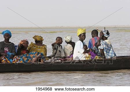 Pinasse on Lake Debo, formed by the seasonal flooding of the Niger River, Mali View Large Photo Image Stock Photo - Pinasse on Lake Debo, formed by the seasonal flooding of the Niger River, Mali. Fotosearch